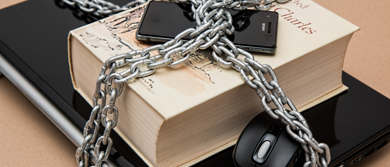 image of locking up your computer, phone, book with a chain